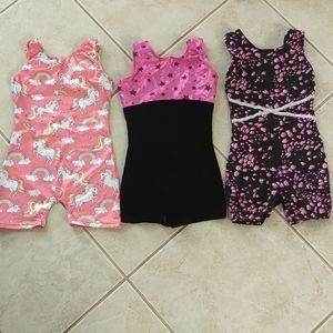 Girl size 8 gymnastics leotard unicorn, pink and black pink and black stars,